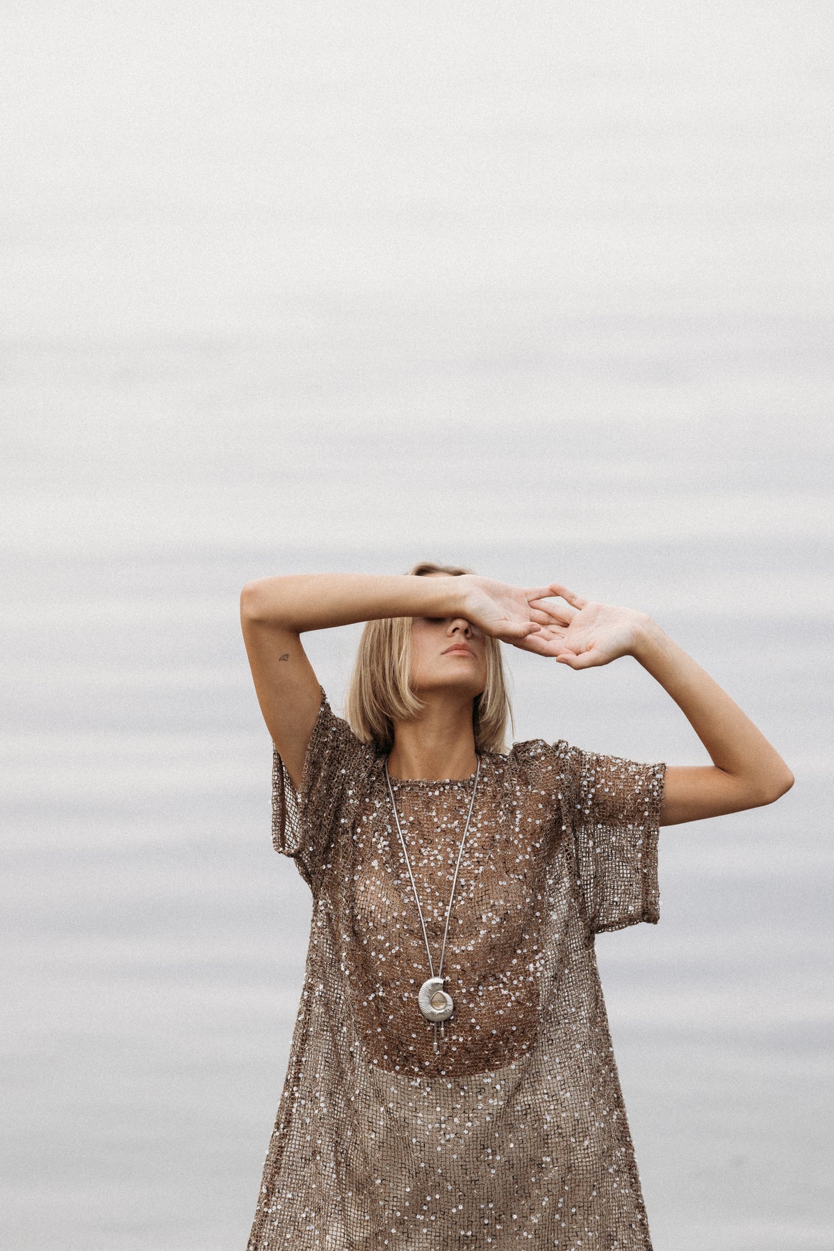 THE DELPHINE IN SILVER WITH GOLD RUTILATED QUARTZ